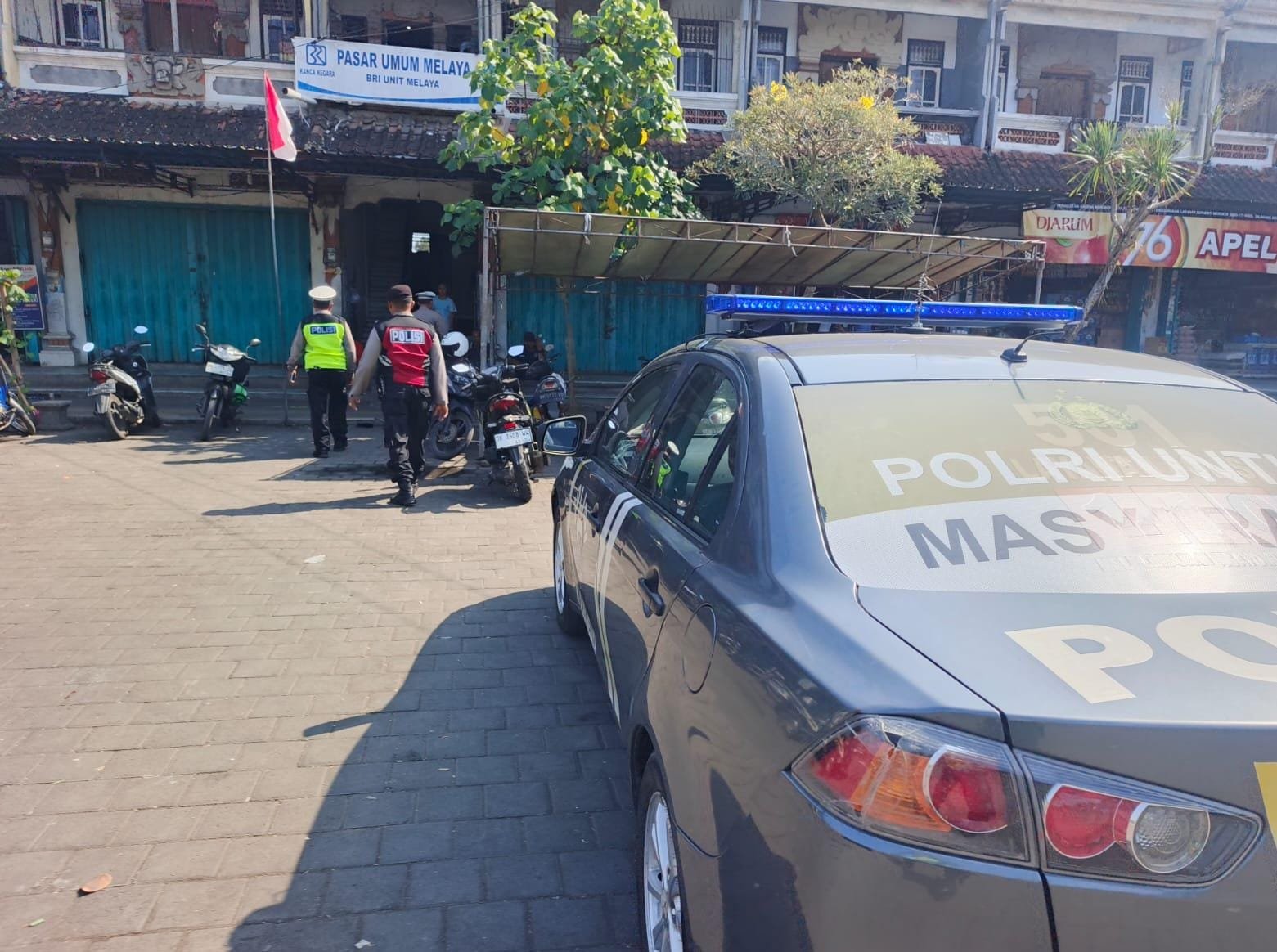 Patroli Cahaya Biru Polsek Melaya Sasar Pasar dan Pertokoan, Warga Diimbau Manfaatkan Layanan 110